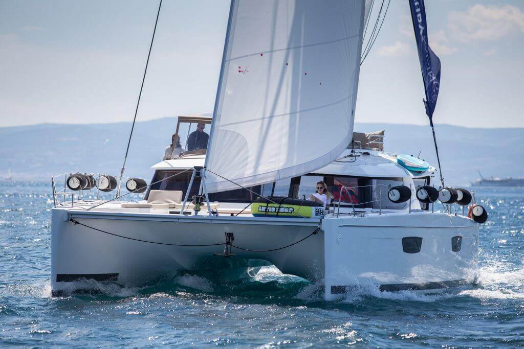 yacht sailing fast through the sea